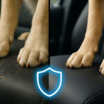 A dog is sitting on a quilted car seat cover. The car is a modern SUV.