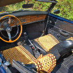 Close-up of beaded car seat covers installed in vehicle for long-drive comfort