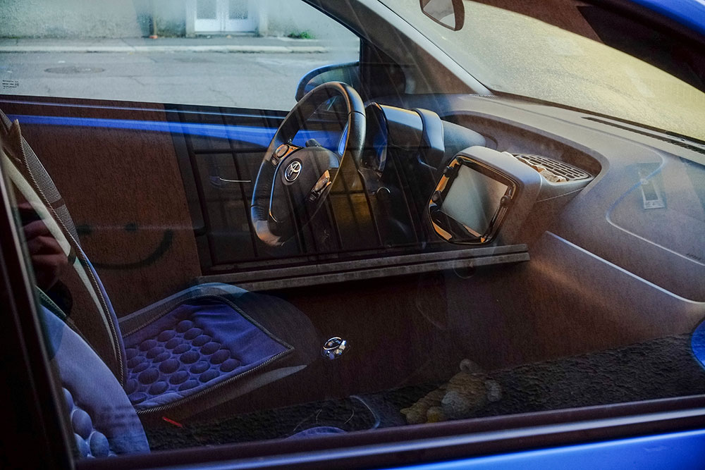 Close-up of custom Toyota seat covers in a family SUV with two-tone stitching