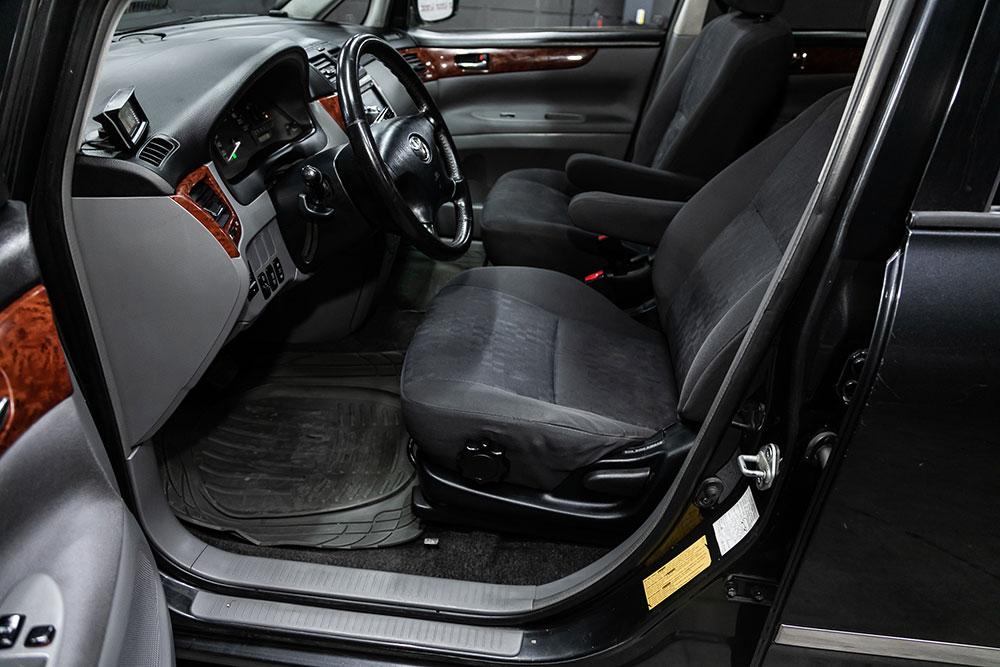 Close-up of custom Toyota seat covers in a family SUV with two-tone stitching
