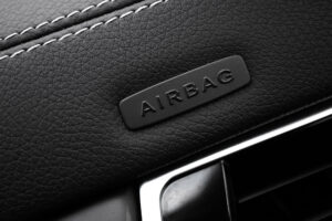 Custom car seat covers with airbag-compatible side stitching installed in a modern vehicle interior
