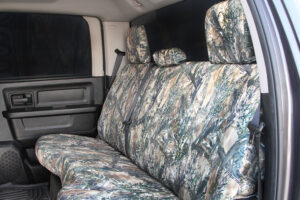 Custom bench seat covers installed in a Toyota Pickup interior