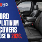 Hero image for Top Ford F-150 Platinum Seat Covers to Choose in 2026 showing a premium Ford F-150 Platinum interior with tailored black seat covers and CalTrend blue, red, and white branding.